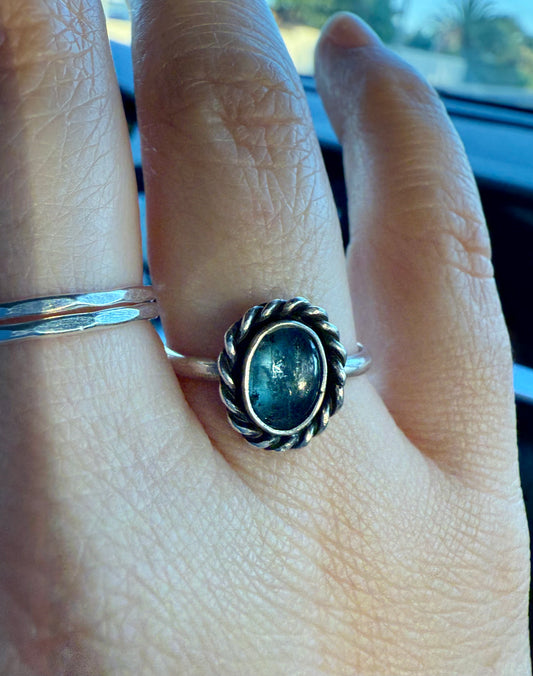 Twisted blue ring